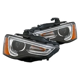 Replacement - Driver and Passenger Side Headlight Set (Standard Line)