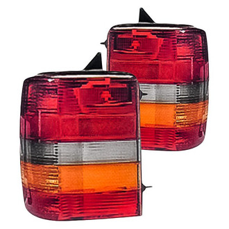 Replacement - Driver and Passenger Side Tail Light Lens and Housing Set (Standard Line)