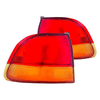 Replacement - Driver and Passenger Side Outer Tail Light Lens and Housing Set (Standard Line)