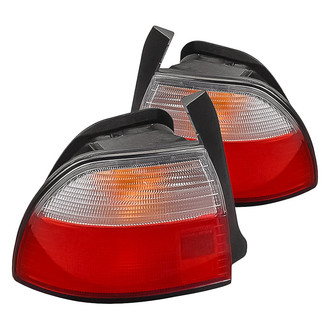 Replacement - Driver and Passenger Side Outer Tail Light Lens and Housing Set (Standard Line)