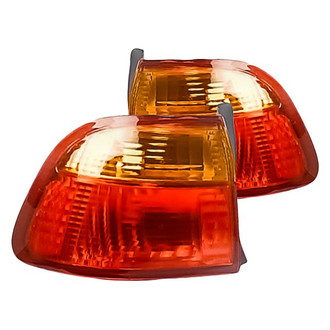 Replacement - Driver and Passenger Side Outer Tail Light Lens and Housing Set (Standard Line)