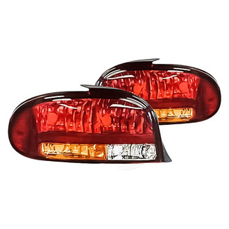 Replacement - Driver and Passenger Side Tail Light Lens and Housing Set (Standard Line)