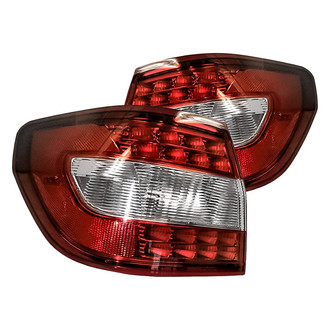 Replacement - Driver and Passenger Side Outer Tail Light Lens and Housing Set (Standard Line)