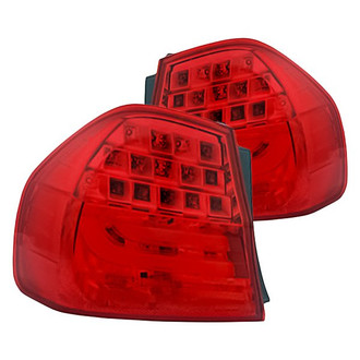 Replacement - Driver and Passenger Side Outer Tail Light Lens and Housing Set (Standard Line)