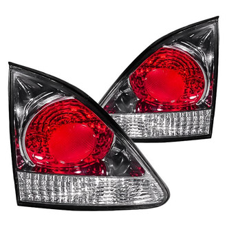 Replacement - Driver and Passenger Side Inner Tail Light Lens and Housing Set (Standard Line)