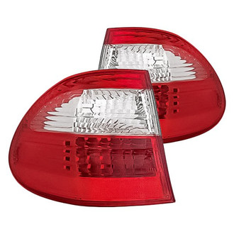 Replacement - Driver and Passenger Side Outer Tail Light Lens and Housing Set (Standard Line)
