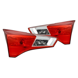 Replacement - Driver and Passenger Side Inner Tail Light Lens and Housing Set (CAPA Certified)