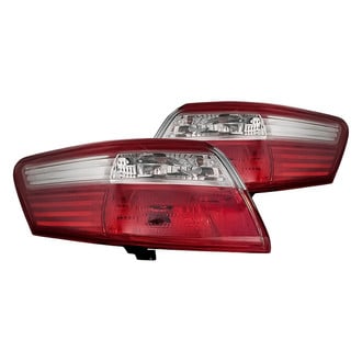 Replacement - Driver and Passenger Side Outer Tail Light Lens and Housing Set (Standard Line)
