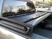 Tri-fold design allows easy access to your truck bed