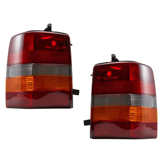 TYC® - Driver and Passenger Side Replacement Tail Light Lens and Housings (Standard Line)