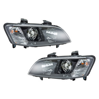 TYC® - Driver and Passenger Side Replacement Headlight Set (CAPA Certified)