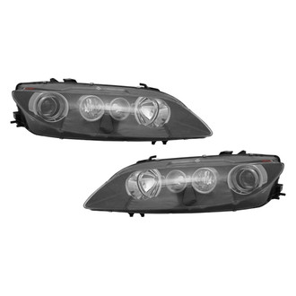 TYC® - Driver and Passenger Side Replacement Headlight Set (Standard Line)