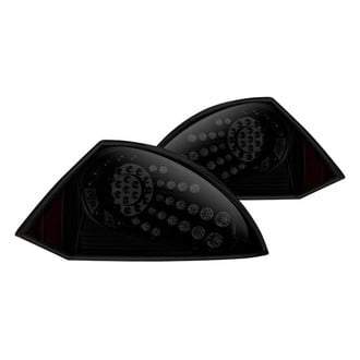 Winjet® - Driver and Passenger Side Black/Smoke LED Tail Lights
