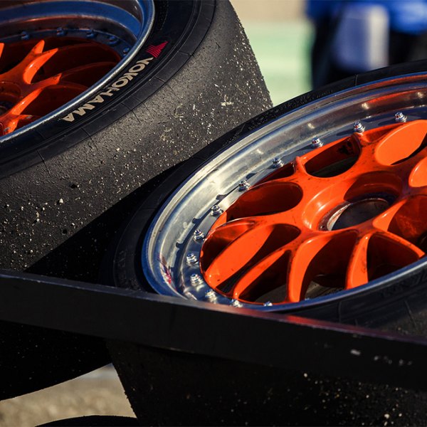 YOKOHAMA® - Advan A005 Tires on Orange Wheels